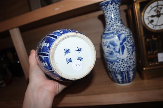 A pair of 19th century Chinese blue and white vases height 30cm